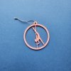 Pink Glow in the Dark Pole Dance Ornament (Pose B) on a blue background. Poledance Xmas Gift Idea
